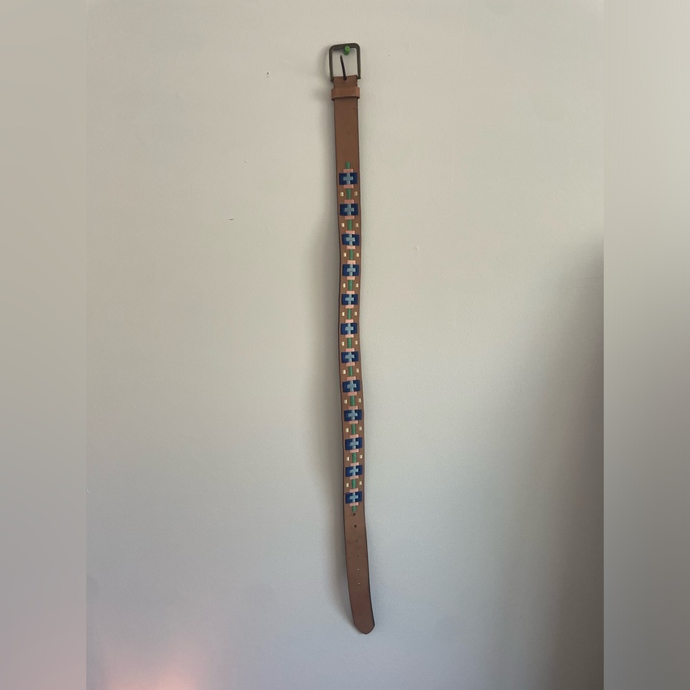 Tan belt with design